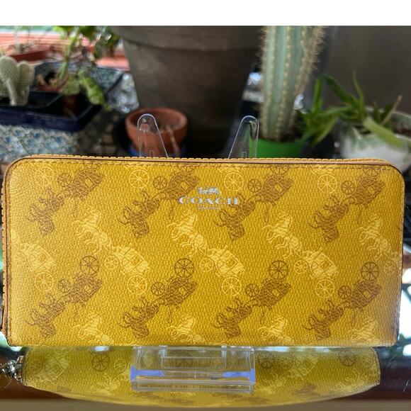 COACH Accordion Zip Wallet with Horse and Carriage Print in Yellow - Picture 1 of 10